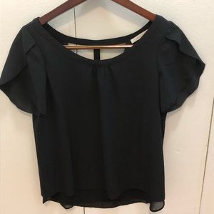 Cooper & Ella black short-sleeve blouse.
